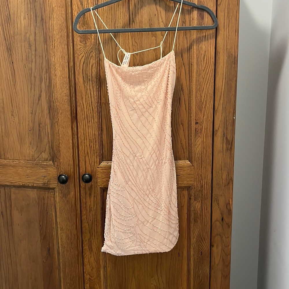 never worn was going to wear to homecoming but the color didn’t look good on me